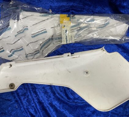 Genuine NOS 1984 Side LEFT Panel & Good USED RIGHT - 1 pair. Side Panels 1984 2t  15-19-775-01 & 15-17-745-01 / 15-17-746-01